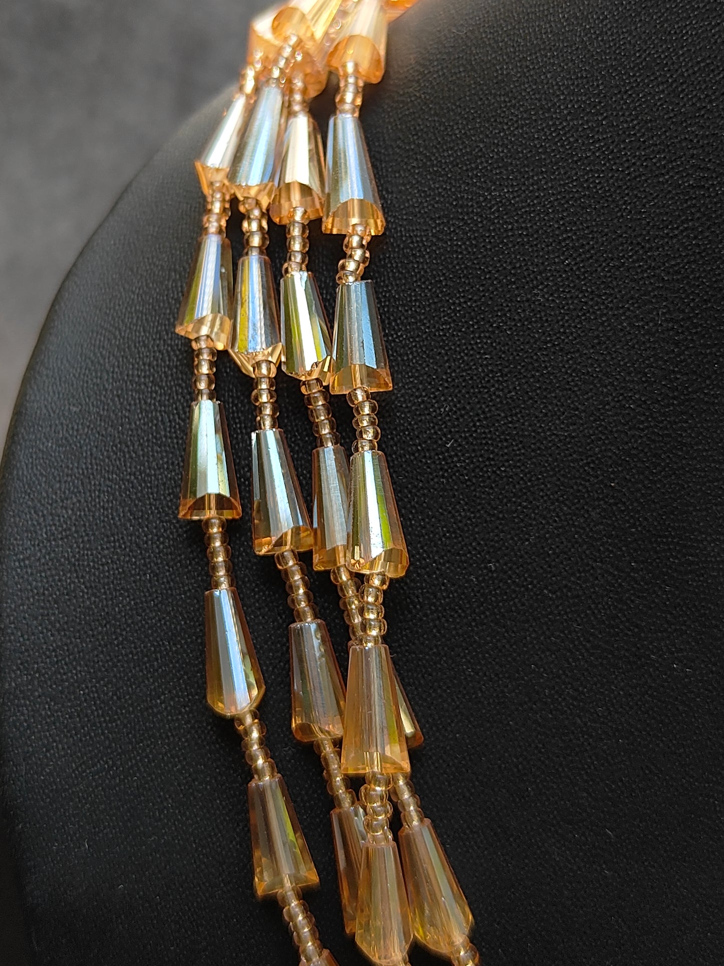 Multiple layered golden neckpiece