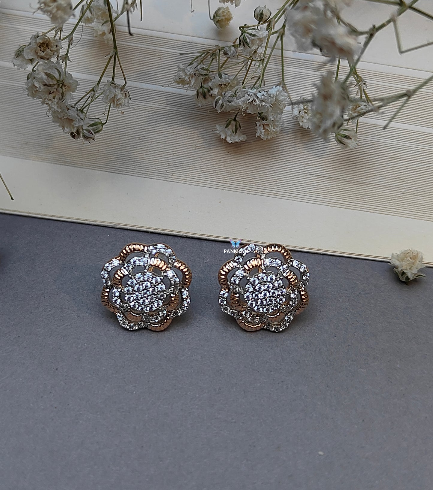 Beautiful dual tone flower earrings