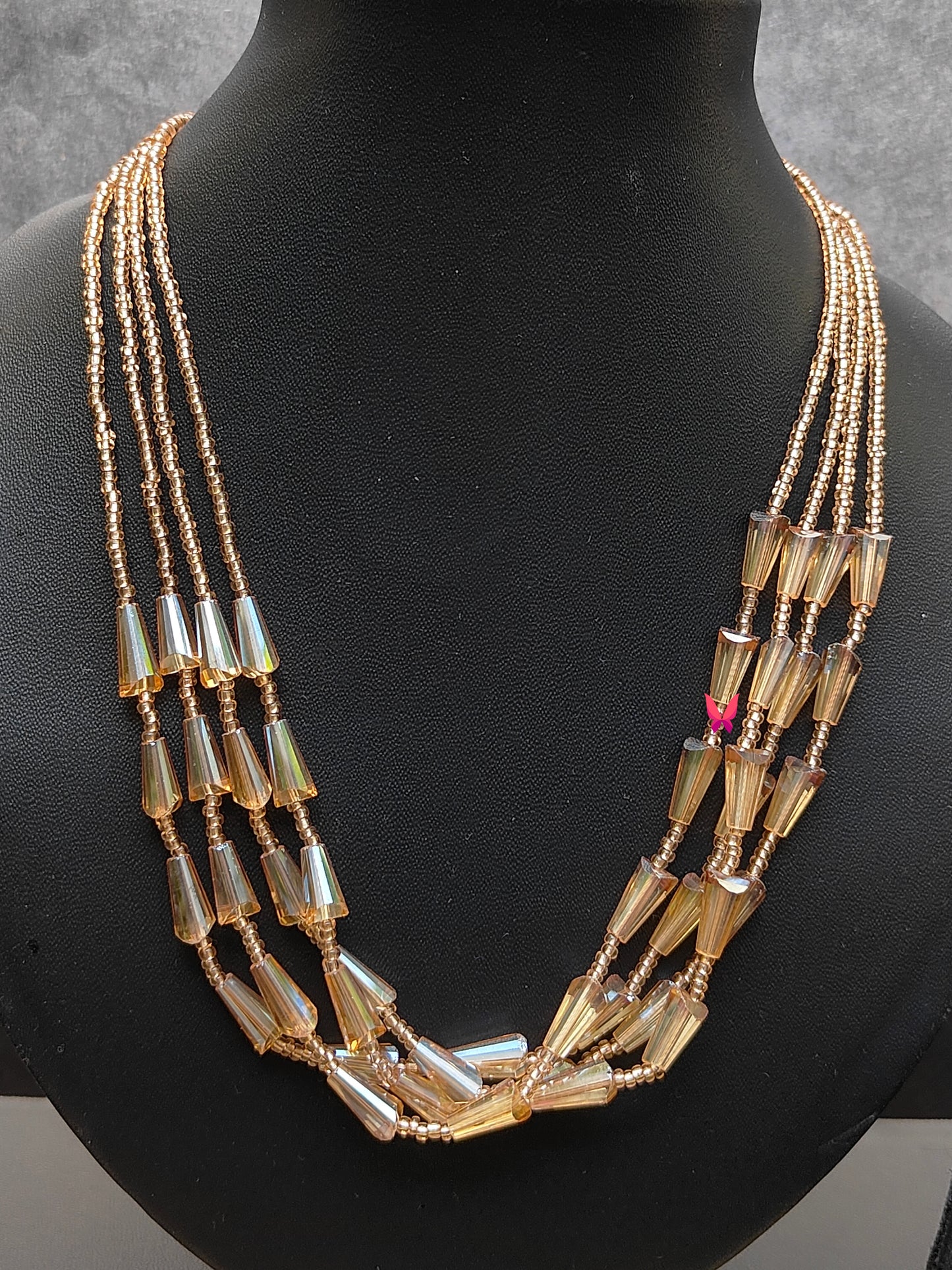 Multiple layered golden neckpiece